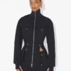 La veste en denim fendue La veste en denim fendue