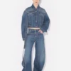 Le jean en denim bleu à lanière Le jean en denim bleu à lanière