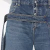 Le jean en denim bleu à lanière Le jean en denim bleu à lanière