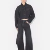 Le jean en denim noir à lanière Le jean en denim noir à lanière