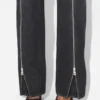 Le jean noir à fermetures éclair