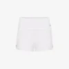 Le mini-short blanc à jarretelles Le mini-short blanc à jarretelles