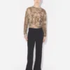 Le pantalon noir à étriers