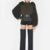 Le pull à mailles bouclées