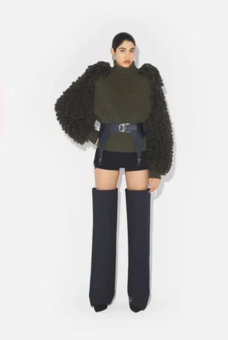 Le pull à mailles bouclées Le pull à mailles bouclées