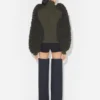 Le pull à mailles bouclées