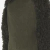 Le pull à mailles bouclées