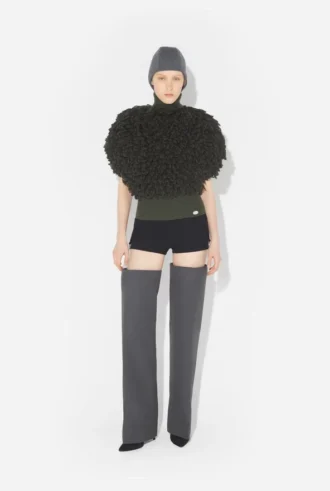Le pull sans manches à mailles bouclées Le pull sans manches à mailles bouclées