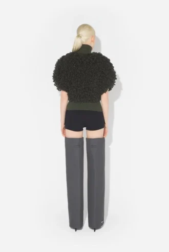 Le pull sans manches à mailles bouclées Le pull sans manches à mailles bouclées