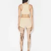 Le soutien-gorge beige à patch Gaultier