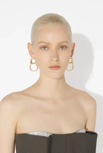 Les boucles d&rsquo;oreilles « anneaux de canette » dorées
