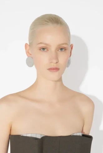 Les boucles d&rsquo;oreilles « Can » argentées